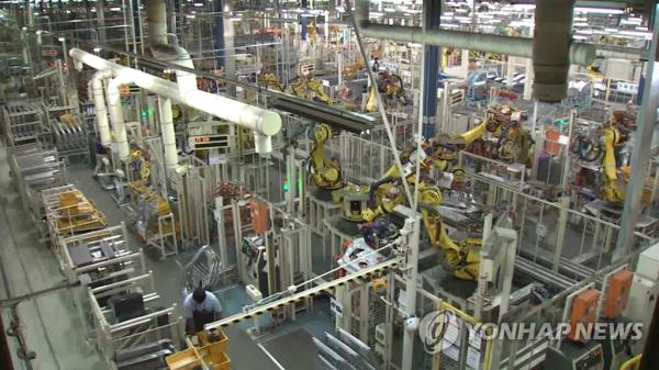 This undated image, provided by Yo<em></em>nhap News TV, shows an unidentified production line at a factory. (PHOTO NOT FOR SALE) (Yonhap)