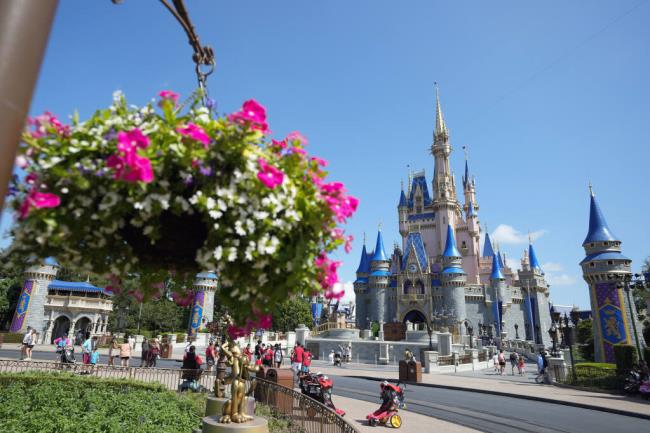 The Cinderella Castle is seen at the Magic Kingdom at Walt Disney World Friday, July 14, 2023, in Lake Buena Vista, Fla. Disney is asking a Florida judge to toss out a lawsuit filed by Gov. Ron DeSantis' appointees to Disney World's governing district. (AP Photo/John Raoux)