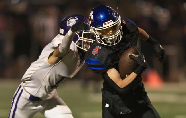 Analy receiver Logan Mitchell gets ahead of Petaluma defender Kairos Go<em></em>nzalez for a long touchdown reception during the Tigers’ victory over the Trojans, Friday, Sept. 9, 2022 at Analy High School in Sebastopol. (Kent Porter / The Press Democrat)