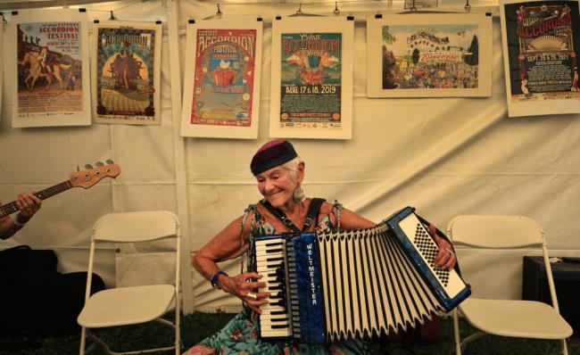 Laurie Lippin from Greenville, an accordion player for Two Tribes, joins in on a jam session during the Cotati Accordion Festival, Saturday, Aug. 19, 2023. (Kent Porter / The Press Democrat) 2023