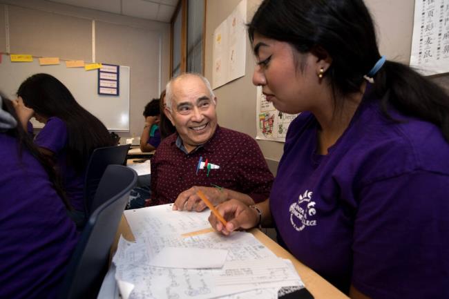 Roberto Ramirez, 2023 Campeón Award winner and retired high school teacher, helps student, Alexandra Santiago, 16, of Cloverdale, during an algebra and geometry class in the Adelante Summer School Program at Santa Rosa Junior College, Wednesday, July 19, 2023 in Santa Rosa.  (Darryl Bush / For The Press Democrat)