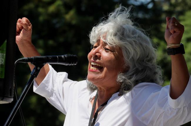 Alicia Sanchez, KBBF board president, speaks to the crowd at KBBF radio's 50th anniversary celebration, held at Bayer Park, Sunday, July 23, 2023 in Santa Rosa. (Darryl Bush / For The Press Democrat)