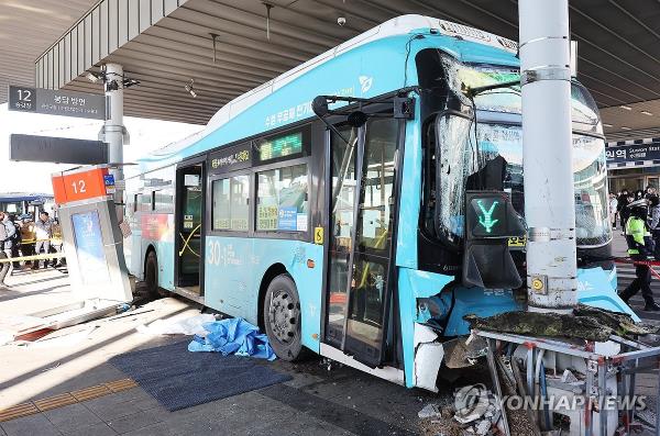 A city bus is damaged after it struck people near a bus transfer center at Suwon Station in Suwon, south of Seoul, leaving at least one dead and 11 injured, on Dec. 22, 2023. (Yonhap)