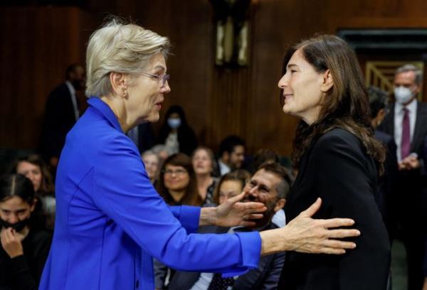 Sen. Elizabeth Warren (D-Mass.), who recommended Rikelman to the White House for a judgeship, greets Rikelman ahead of her Senate co<em></em>nfirmation hearing.